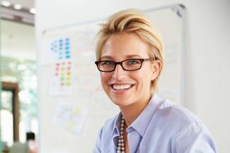 Portrait Of Businesswoman Working In Creative Office